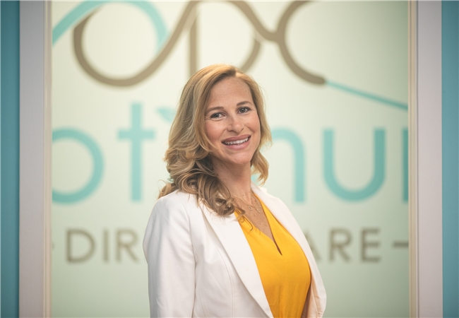 Toni Muzzonigro - 7575 Dr. Phillips Boulevard, Orlando, Florida, 32819